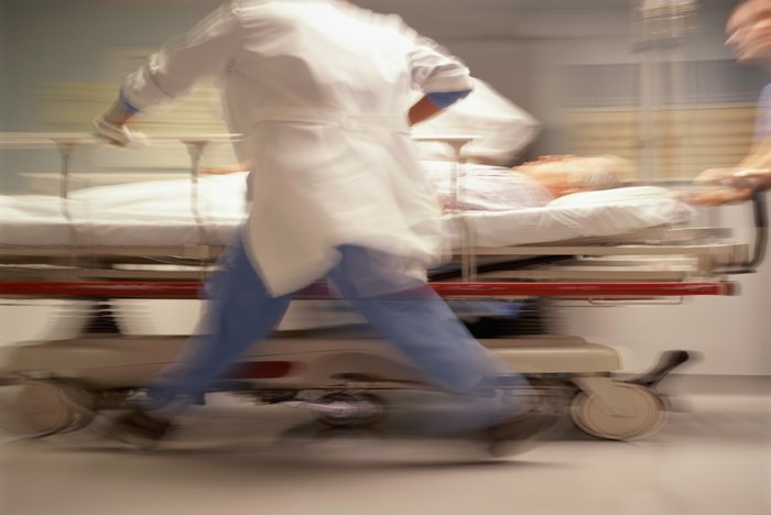 Motion scene of patient being moved in a hospital