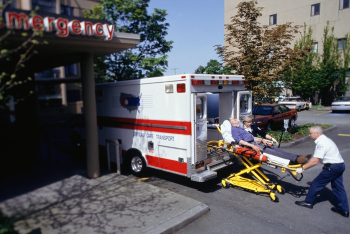 Patient arriving at hospital - treating head injuries using emergency suction pump