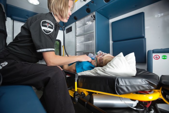 EMT Treating Patient | What to Include With Your Portable Suction Device